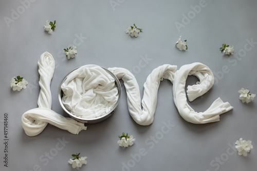 word love with nest background for newborn and baby. Basket for newborn photo shoot. 