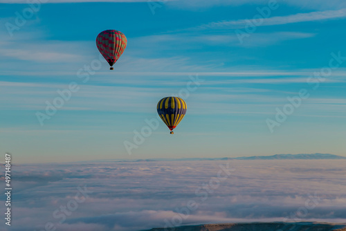 Hot air ballons flying over Cappadocia National Park Goreme Turkey