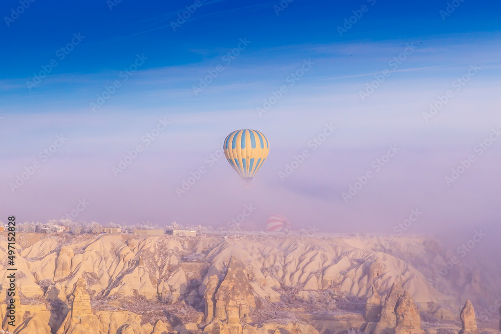 Hot air ballons flying over Cappadocia National Park Goreme Turkey