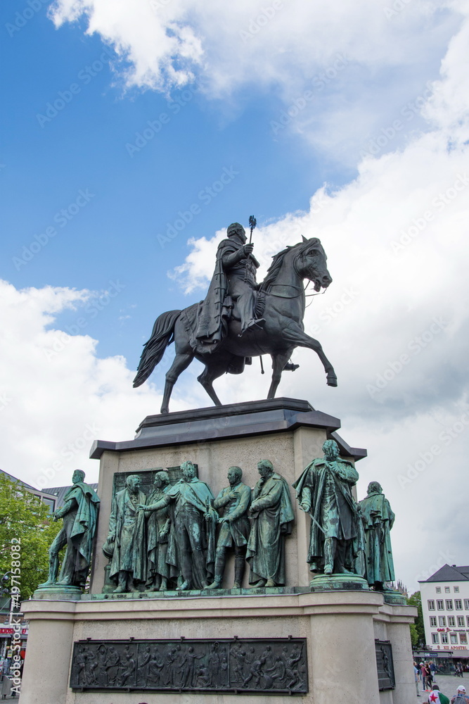 Fototapeta premium Cologne, Germany, may 2017,Monument in center of Cologne of Kaiser Friedrich Wilhelm near to river Rhine