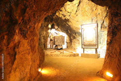 Underground silver mine mining heritage of the city of Zacatecas Mexico where you can see large rocks and illuminated tunnels to walk
 photo