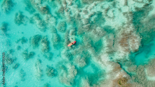 People Riding Kayak in Los Rapidos Lagoon in Bacalar, Mexico. Aerial View