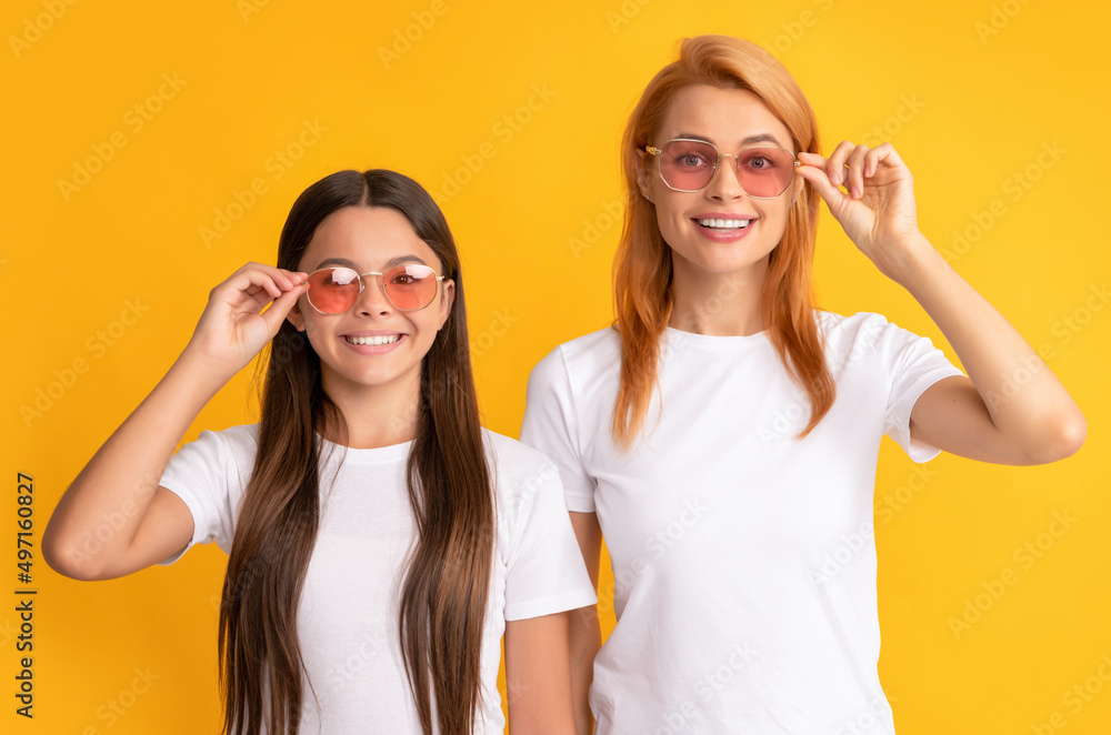 smiling family portrait of single woman mother and kid in glasses, fashion smiling family portrait of single woman mother and kid in glasses, fashion