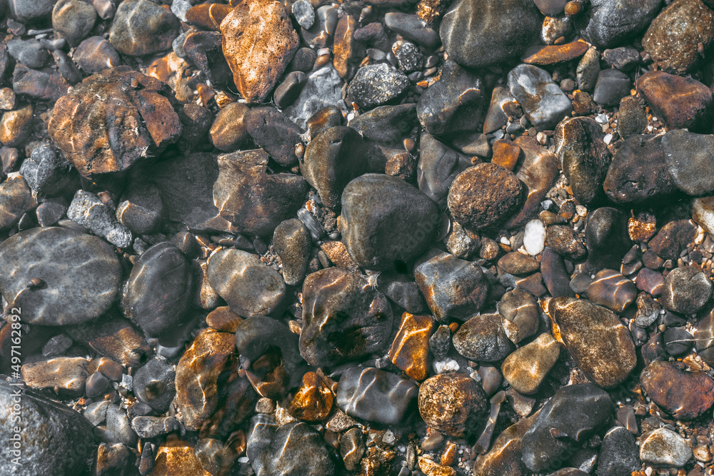 Obraz premium pebbles on shallow river