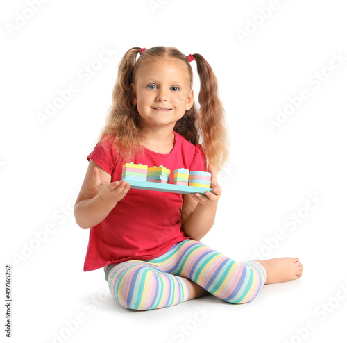 Adorable little girl playin...