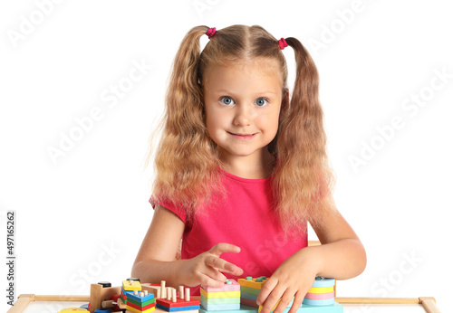 Cute little girl playing wi...