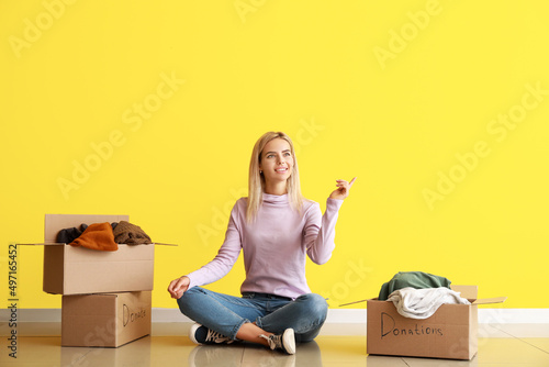 Young woman with donations ...