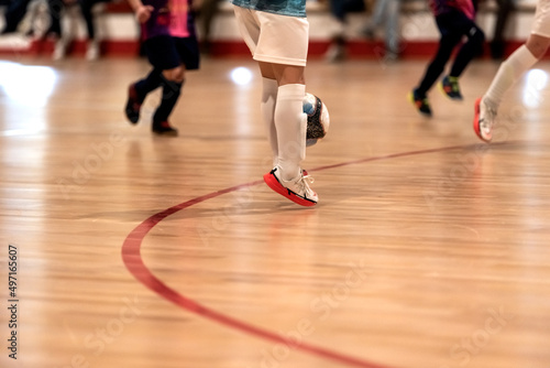 Konstfotografi a child intercepts the ball with both legs