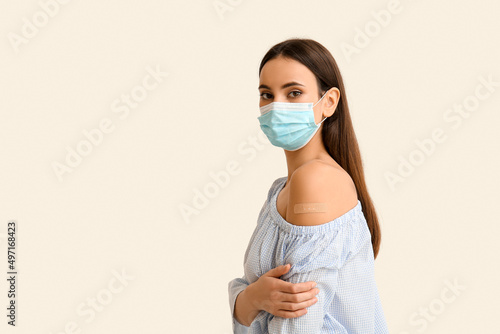 Young woman in mask with ap...