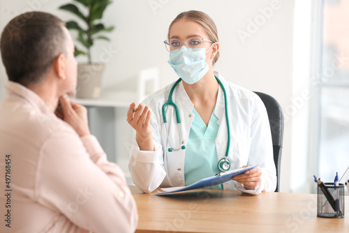 Ill man with sore throat vi...