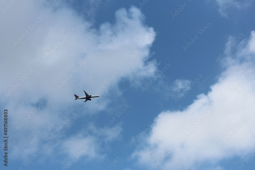 Plane in  the sky taken from below