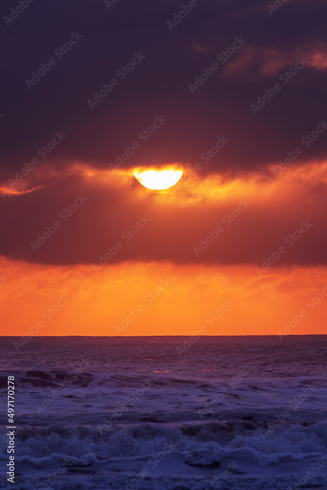 Ocean sun rise in the clouds