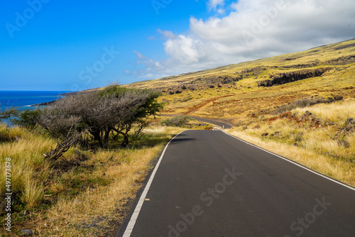 Piilani Highway near the Manawainui Sea Cave in the southeast of Maui island in Hawaii - Natural arch on the slopes of the Haleakala volcano above the Pacific Ocean