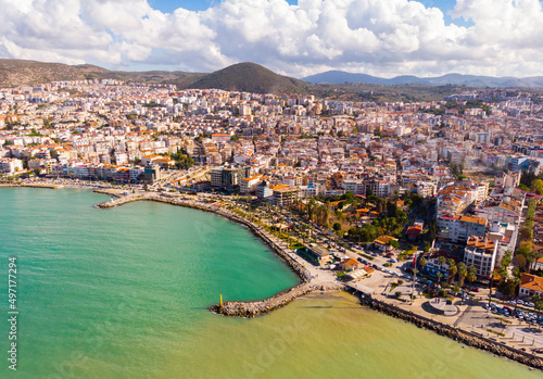 View from drone of large resort town of Kusadasi on Turkey Aegean coast on sunny day, Aydin Province © JackF