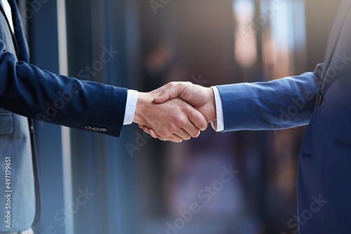 Business collaborations. Cropped shot of two businessmen shaking hands.