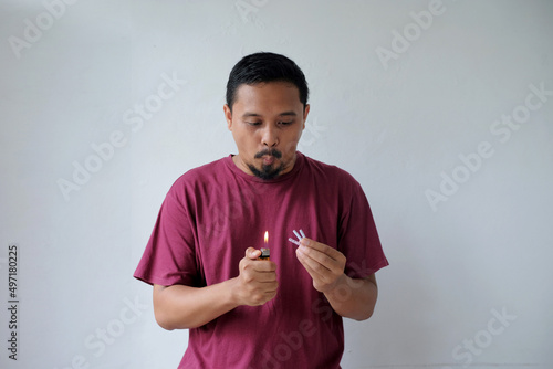 man set off firecrackers with scared face photo