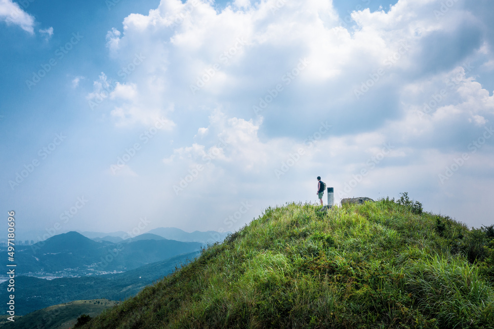 Man on the Peak of Pyramid Hill, Hiking route in Sai Kung, Countryside of Hong Kong East