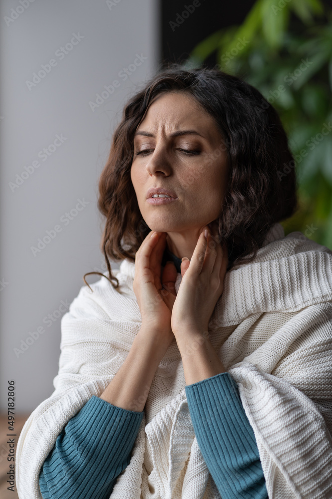 Frustrated woman touch neck check glands during cold, fever and seasonal influenza. Girl suffer from painful throat, ache, swallowing difficulties and loss of voice from angina or coronavirus illness Frustrated woman touch neck check glands during cold, fever and seasonal influenza. Girl suffer from painful throat, ache, swallowing difficulties and loss of voice from angina or coronavirus illness