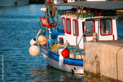 Traditional fishing boats in the port of Agia Napa in Cyprus photo