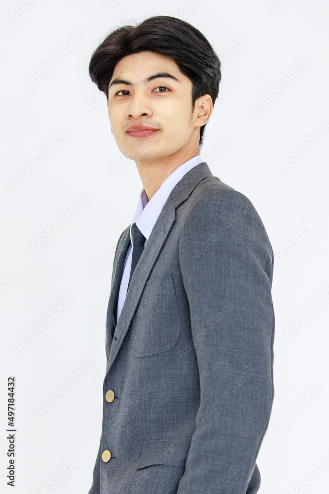 Portrait studio isolated cutout shot Asian young smart confident male professional successful businessman in gray formal business suit standing smiling look at camera on white background Portrait studio isolated cutout shot Asian young smart confident male professional successful businessman in gray formal business suit standing smiling look at camera on white background