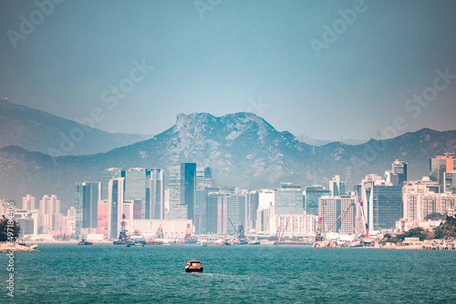 Photography iconic landmark of Hong Kong, Lion Rock, and the business residential area under