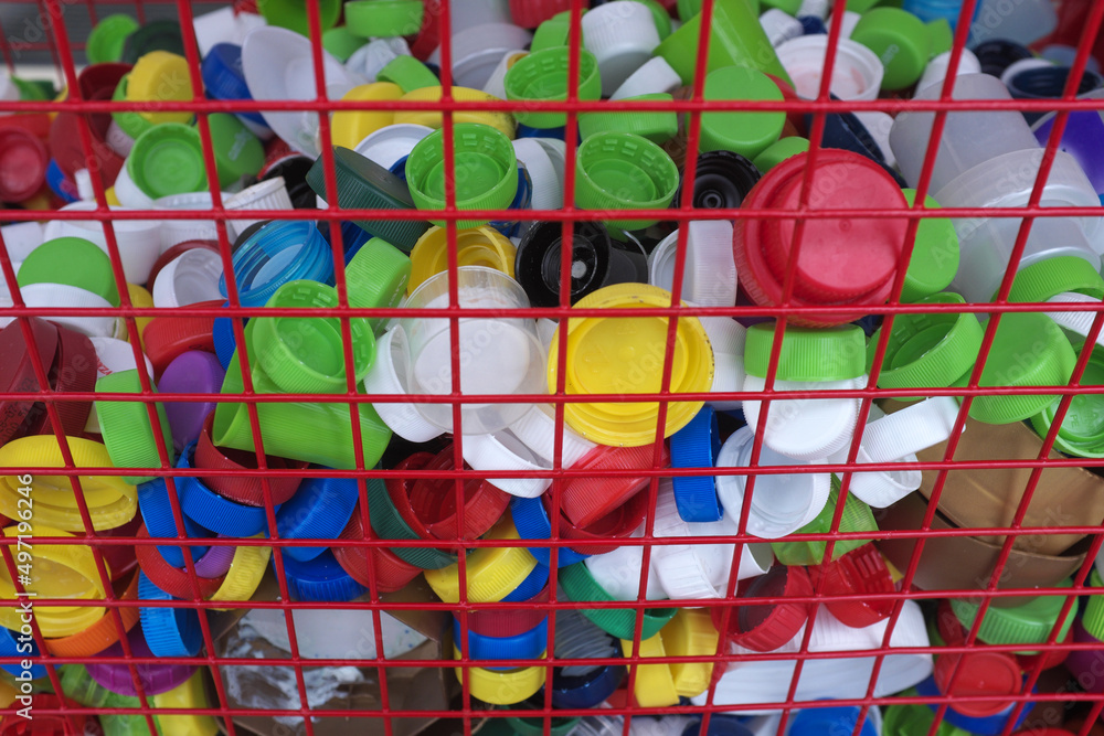 Obraz premium Ecological background, plastic caps, garbage ... 