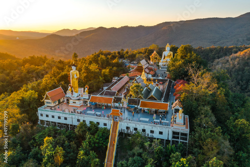 Εκτύπωση καμβά Aerial view of Wat Phrathat Doi Kham, Buddha pagoda and golden chedi in Chiang M