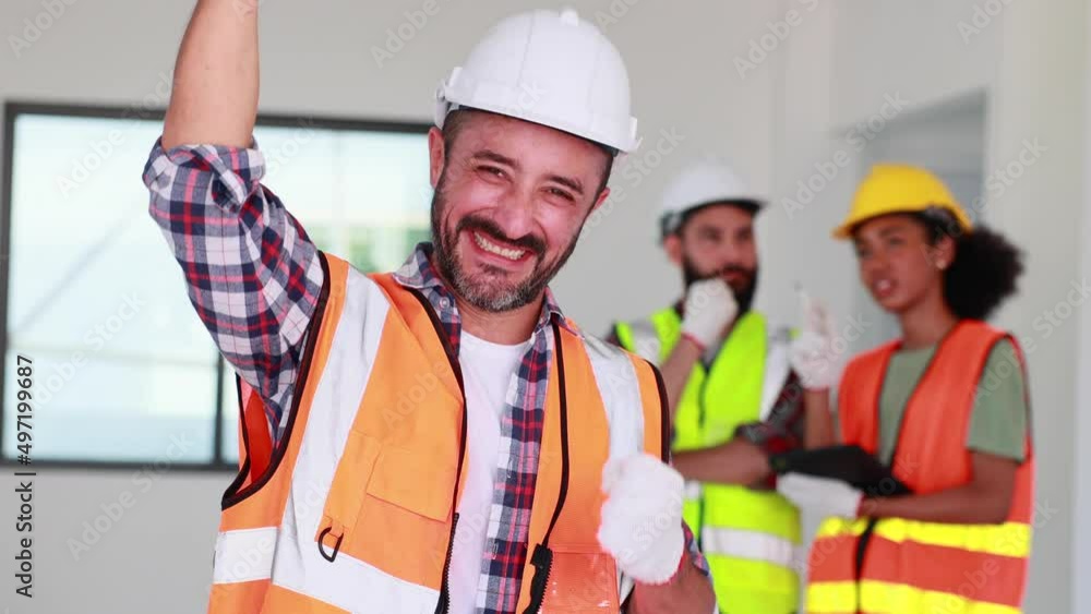 Portrait happy hispanic electrician man worker with professional builder team on construction site. Maintenance service Repair and handyman concept Portrait happy hispanic electrician man worker with professional builder team on construction site. Maintenance service Repair and handyman concept