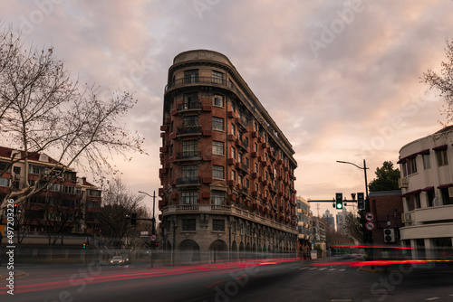 Long exposure picture of Wukang building and passing traffic in Shanghai