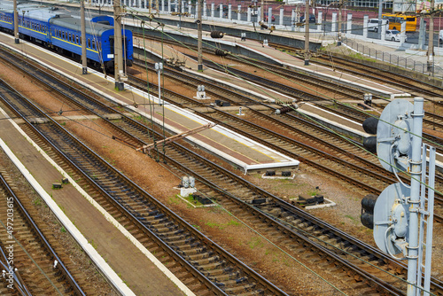 railway station infrastructure - rails, platform and passenger railcars
