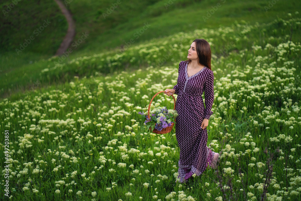 Portrait happy woman enjoying sunset stay on the green grass. Portrait happy woman enjoying sunset stay on the green grass.