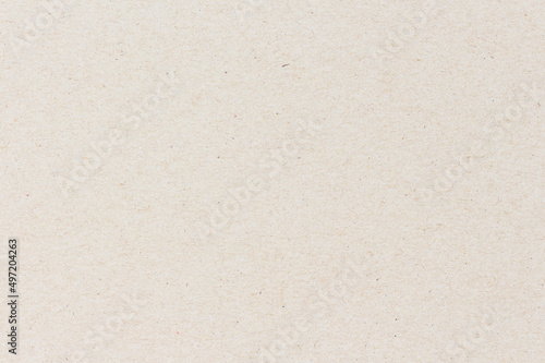 White beige paper background texture light rough textured spotted blank copy space background in beige yellow,brown