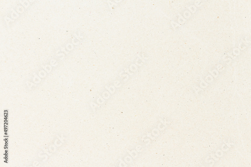 White beige paper background texture light rough textured spotted blank copy space background in beige yellow; brown
