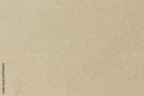 White beige paper background texture light rough textured spotted blank copy space background in beige yellow; brown