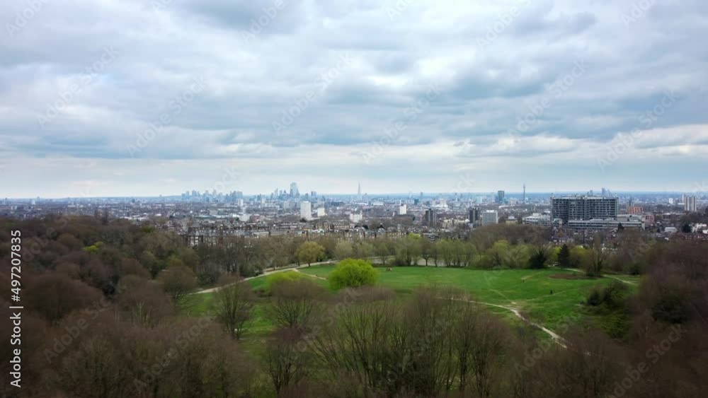 Drone shot flying over Hampstead Heath park with London in backdrop Drone shot flying over Hampstead Heath park with London in backdrop