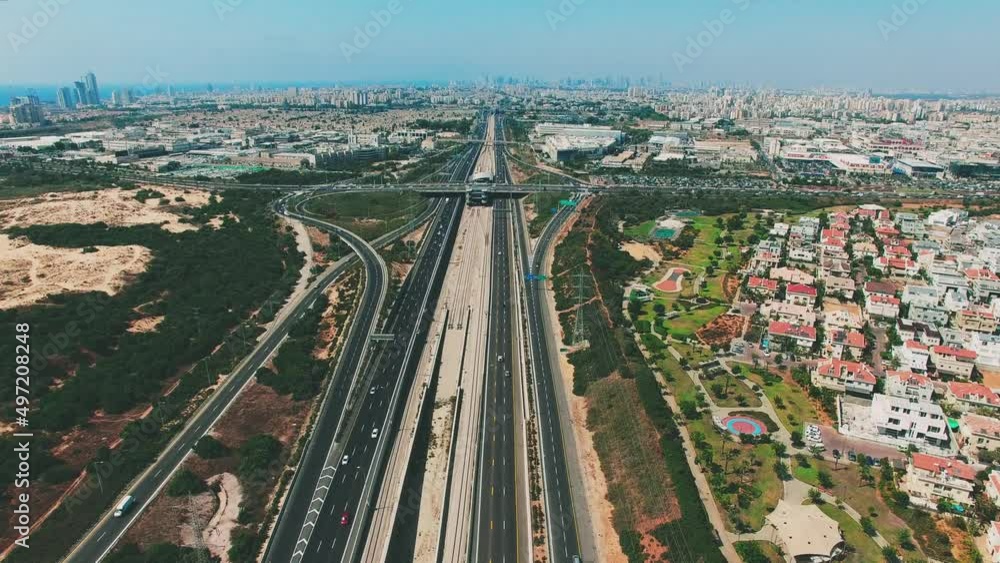 Wide aerial of roads and cities. Wide aerial of roads and cities.