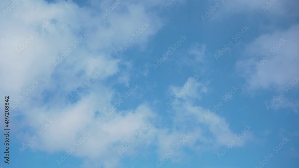 Clouds float across the blue sky, accelerated shooting Clouds float across the blue sky, accelerated shooting