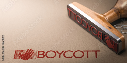 Activism concept. Boycott printed on kraft paper with rubbber stamp and copy space.