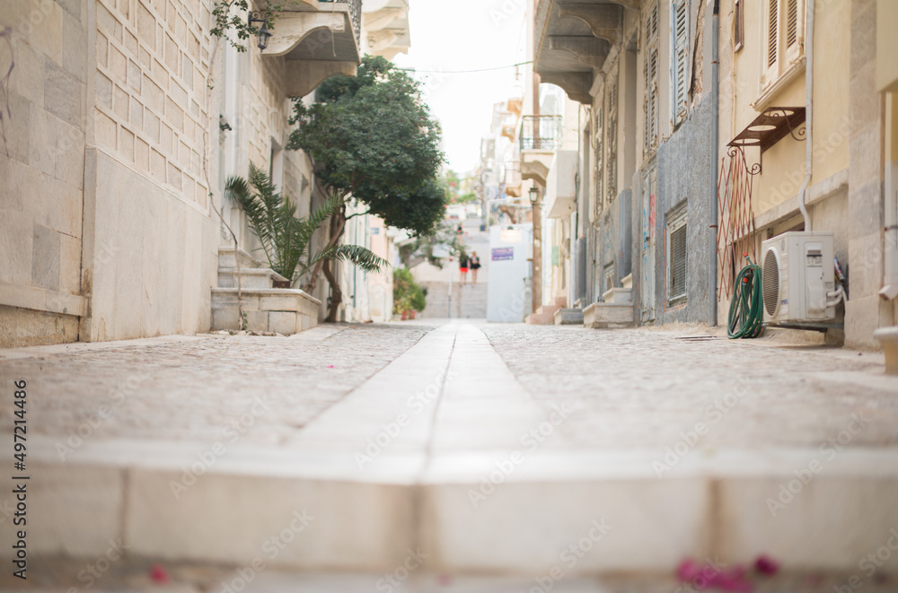 Obraz premium Syros Cycladic Island, the capital of the Cyclades, perfect place for tranquil holiday and ideal to enjoy pristine, empty beaches, traditional villages, excellent gastronomy, and local music