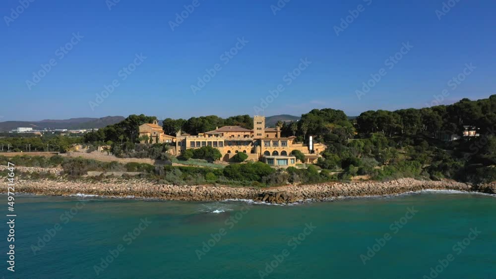 057_2_ojra.uas_Coast_CloseUp_AerialView_4k.Condrón aerial view of a mansion in ascent traveling next to the coast on a sunny day. 057_2_ojra.uas_Coast_CloseUp_AerialView_4k.Condrón aerial view of a mansion in ascent traveling next to the coast on a sunny day.