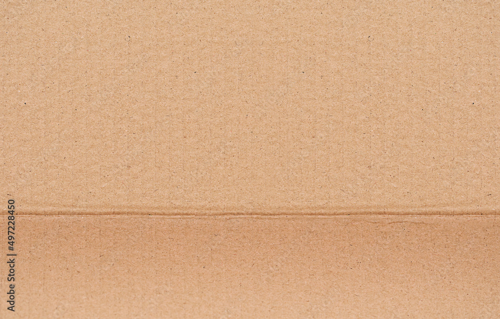 Fototapeta premium High Resolution Cardboard Brown Corrugated Texture, with a bend line