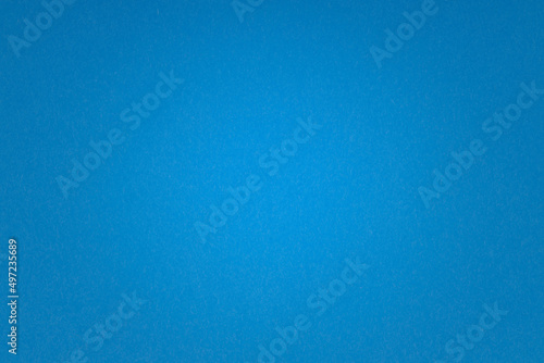 sky royal blue paper background with vignette