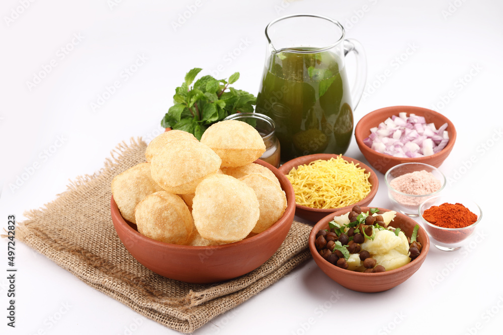 Panipuri or Golgappa is a popular street snack from India. It's a round, hollow puri filled with a mixture of flavoured water and other chat items