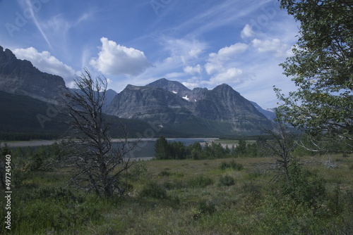 Distant view of the Lake Sherburne and mountains in Glacier National Park in Montana, United States photo