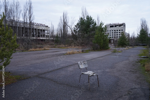 Abandoned chair in Pripyat, abandoned city with radioactive contamination after nuclear disaster in Chernobyl, Ukraine