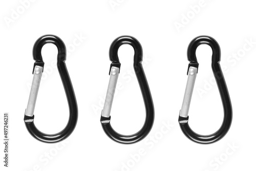 Macro shot metal carabiner on a screw isolated on a white background. Stainless steel safety carabiner isolated with clipping path.