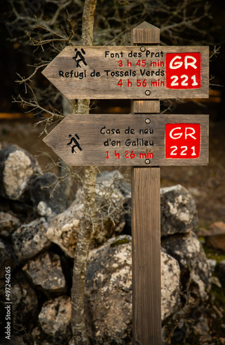 Vertical shot of a sign for the GR221 long-distance hiking trail in Mallorca, Spain photo