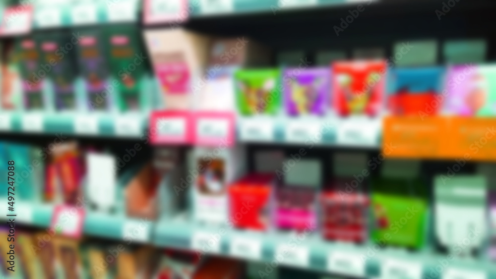 Abstract blur image of supermarket background. Defocused shelves with food. Grocery shopping. Store. Retail place. Rack. Discount price. Inflation and economic crisis concept. Aisle. Merchandise.