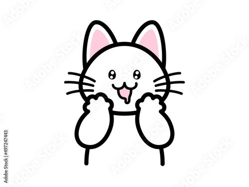 よだれを垂らして正面を見つめる猫