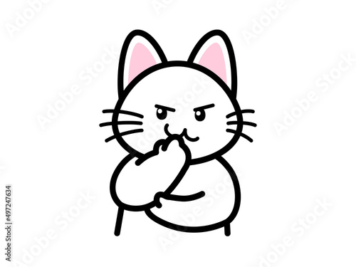 にやりと笑って悪だくみをする猫